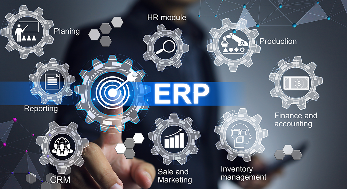 A person touching an erp system on the screen.